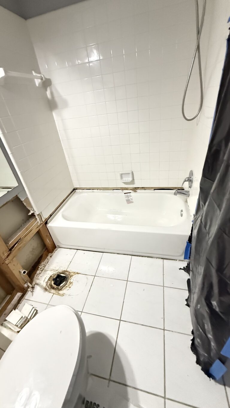 Bathroom remodel in progress: new tub set and toilet flange prep - Blessed Solutions Plumbing, Kissimmee FL