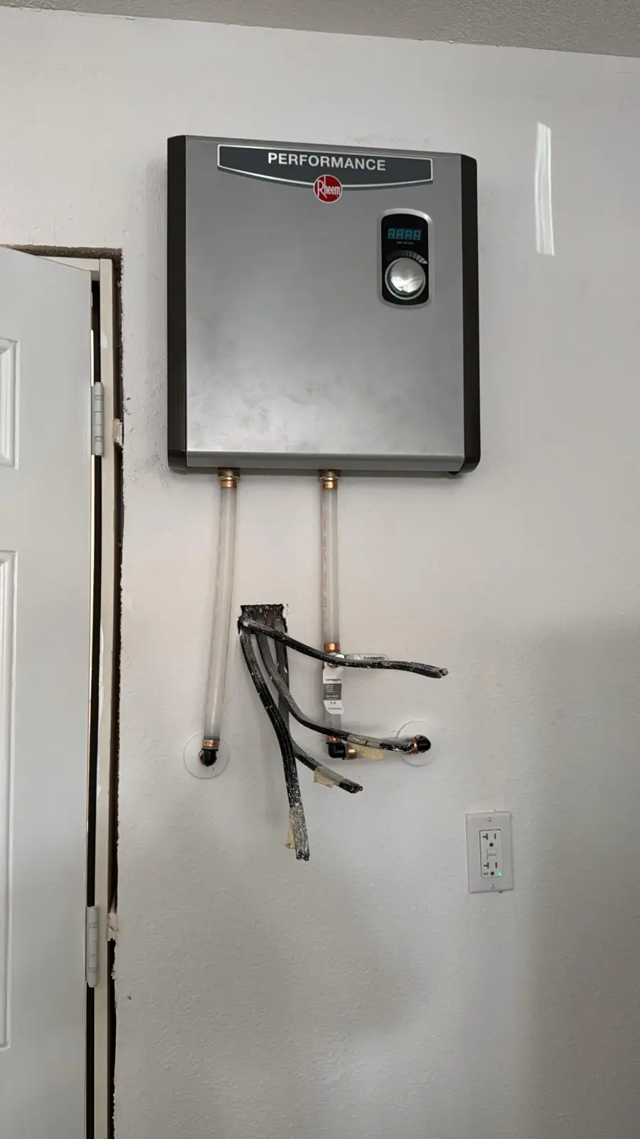 Blessed Solutions Plumbing technician performing water heater installation in Orlando FL
