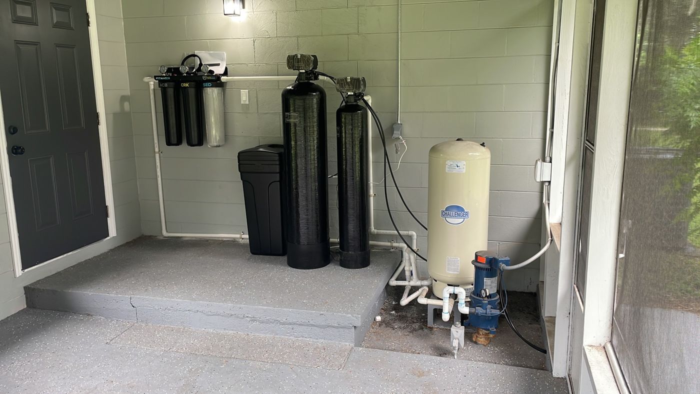 Well water filtration and water softener system with pressure tank installed by BSP1 Plumbing in Central Florida