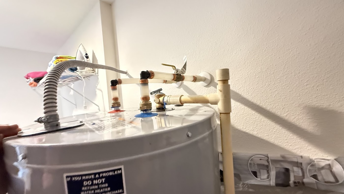 Water heater hookup with PEX and new shut-off valve - water heater installation by Blessed Solutions Plumbing, Orlando FL