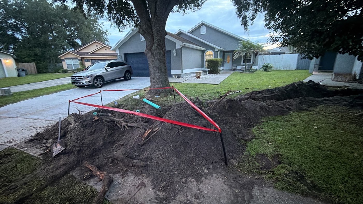 Residential main water line replacement - trench from the meter to the house by Blessed Solutions Plumbing, Orlando FL
